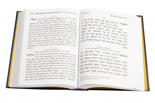 Open High Holiday prayer book with shofar for the Ten Days of Repentance